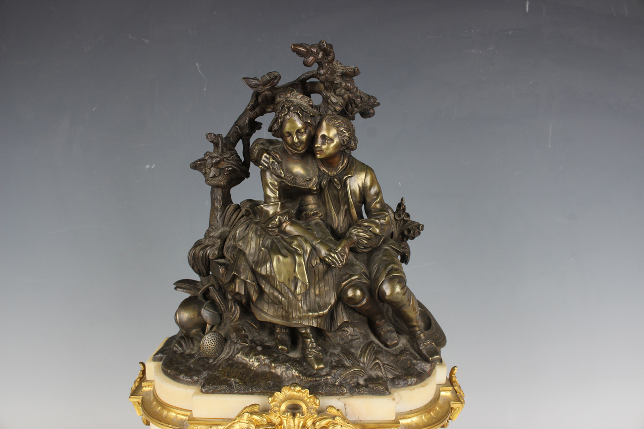 A late 19th century French brown patinated bronze, ormolu and white marble mantel clock, the eight - Image 8 of 9