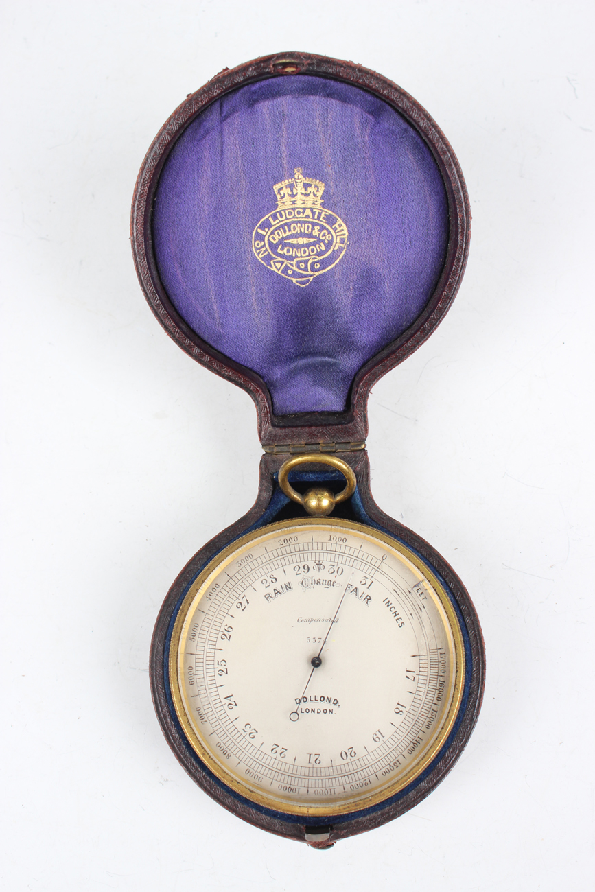 A late 19th century lacquered brass cased pocket aneroid barometer altimeter, the silvered