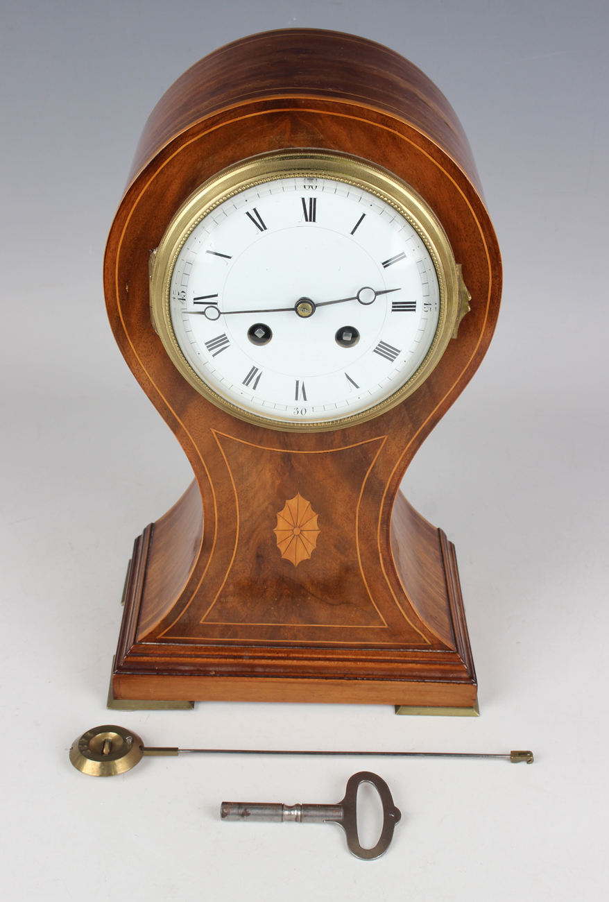 An Edwardian mahogany balloon cased mantel clock with French eight day movement striking hours and - Image 2 of 8