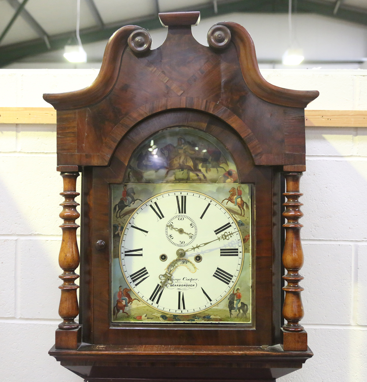 A Victorian mahogany longcase clock with eight day movement striking hours on a bell, the 13-inch