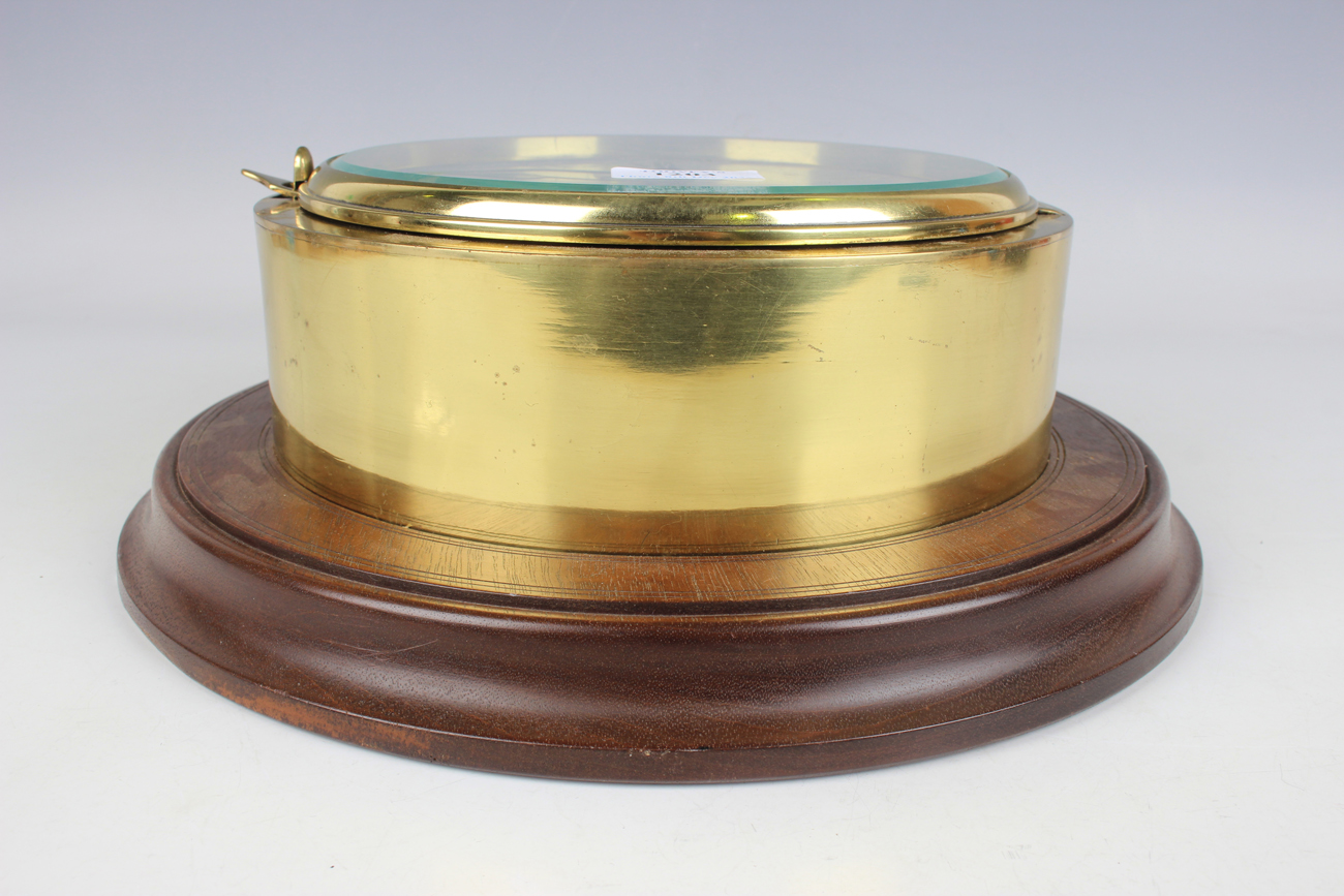 An early 20th century brass circular cased ship's bulkhead type timepiece, the brass four pillar - Image 2 of 9