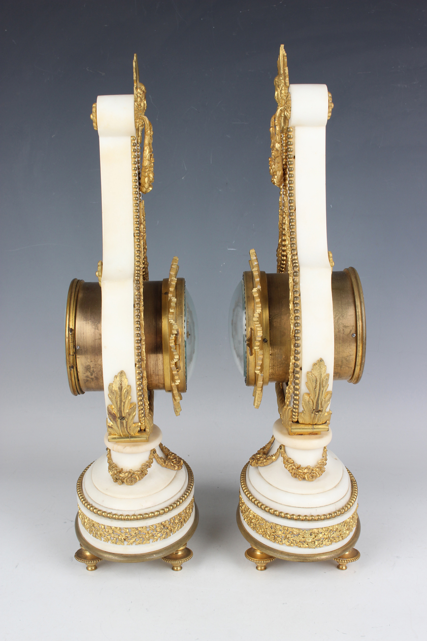 A late 19th century French ormolu mounted white marble Marie Antoinette style mantel clock and - Image 4 of 12