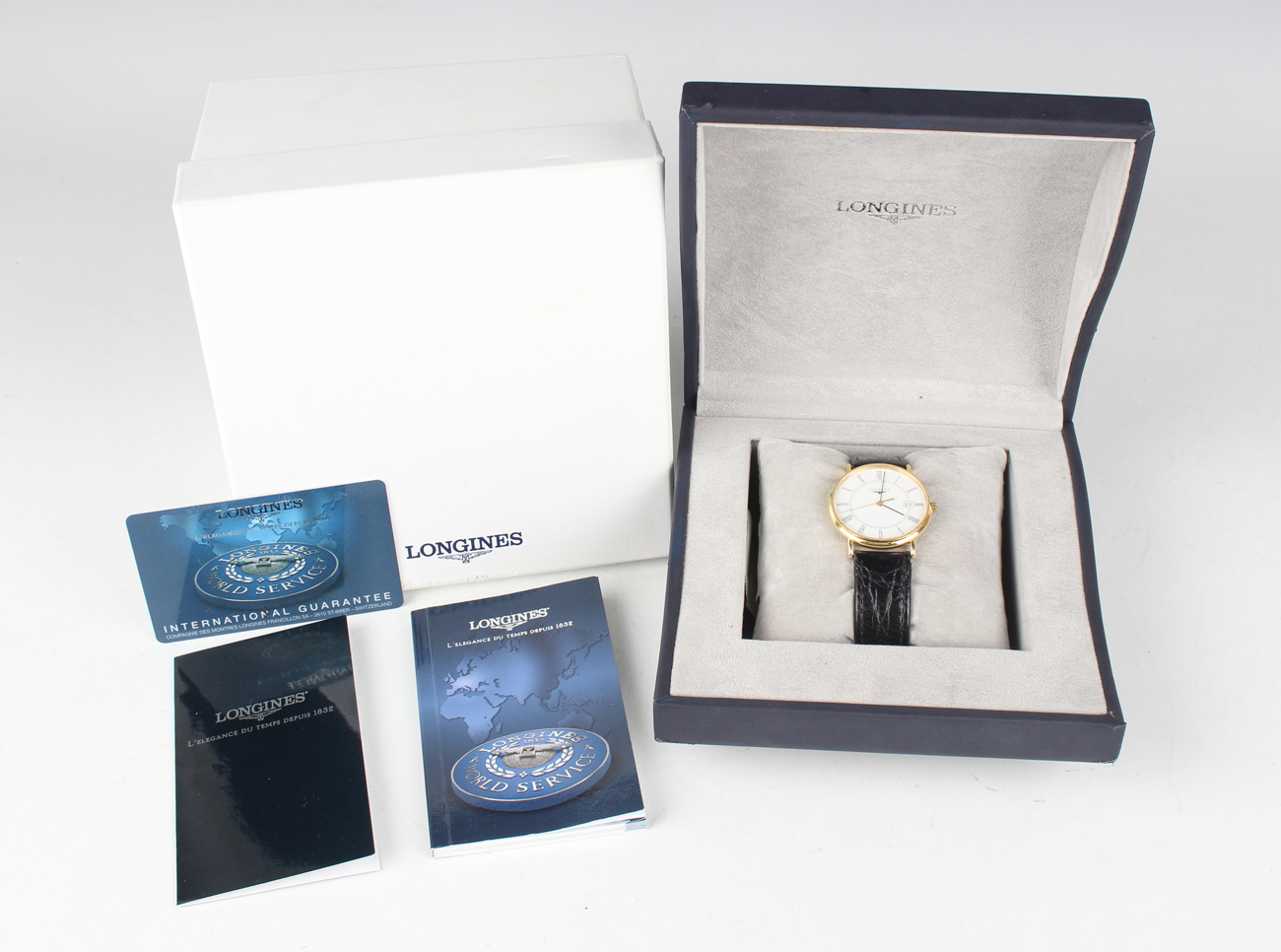 A Longines 18ct gold circular cased gentleman's wristwatch with quartz movement, the signed white - Image 2 of 5