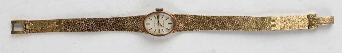 An Omega 9ct gold lady's bracelet wristwatch, the signed circular silvered dial with gilt baton hour - Image 6 of 15