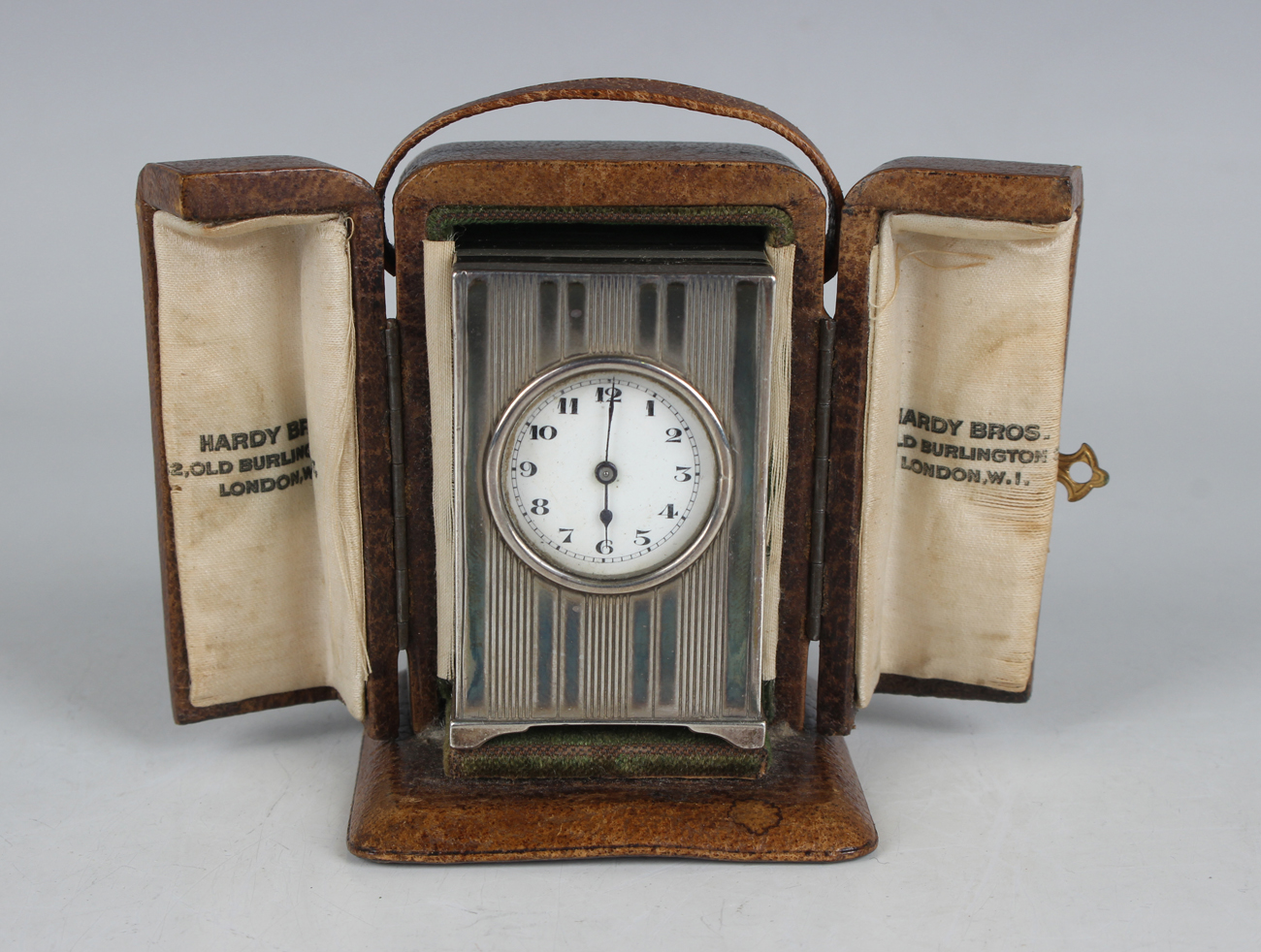An early 20th century French silver miniature carriage timepiece, the movement with platform