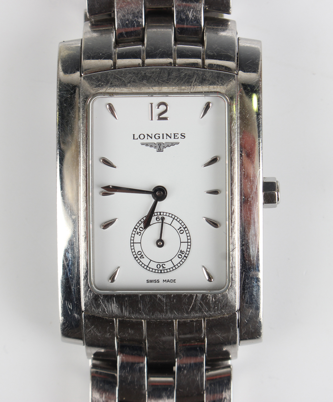 A Longines Dolce Vita steel rectangular cased gentleman's bracelet wristwatch, the signed white dial