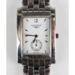 A Longines Dolce Vita steel rectangular cased gentleman's bracelet wristwatch, the signed white dial