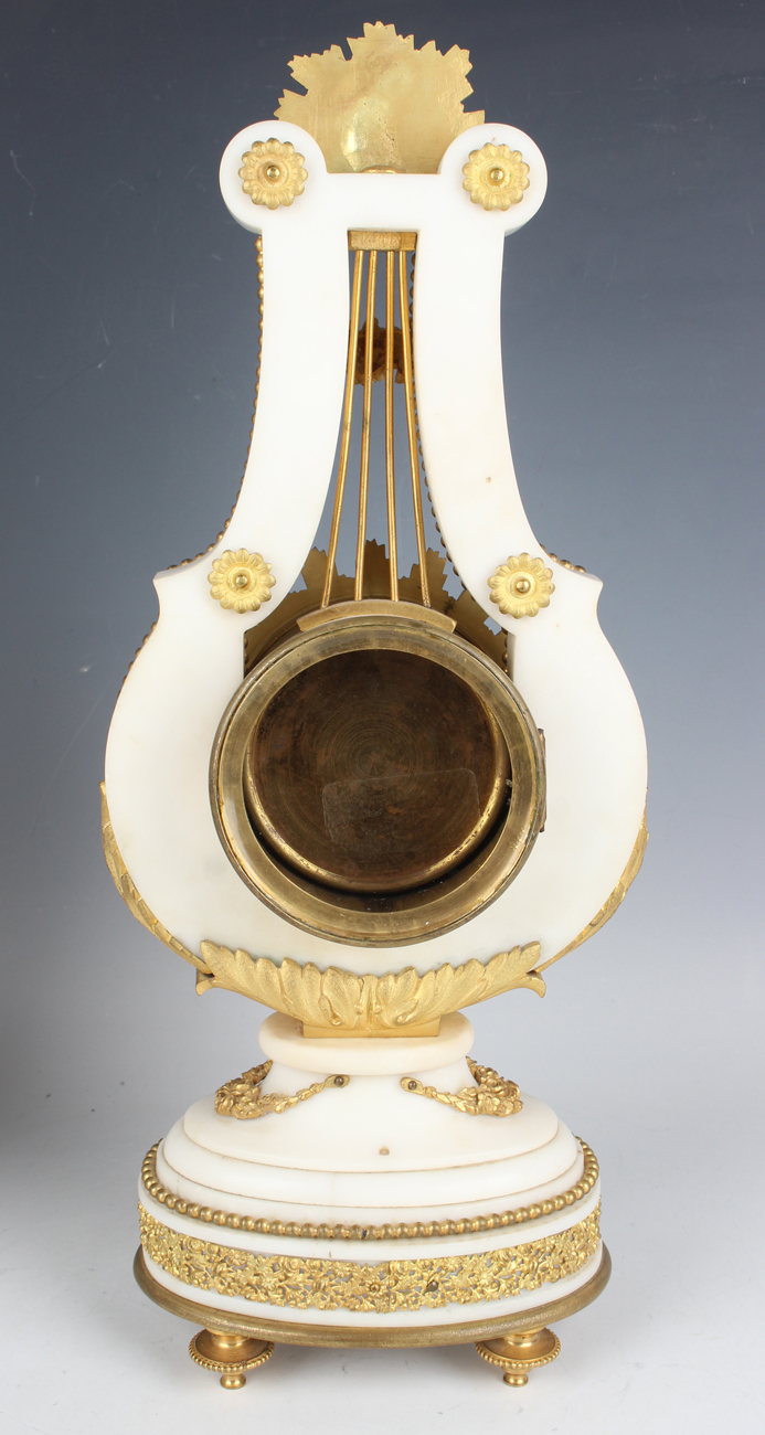 A late 19th century French ormolu mounted white marble Marie Antoinette style mantel clock and - Image 5 of 12