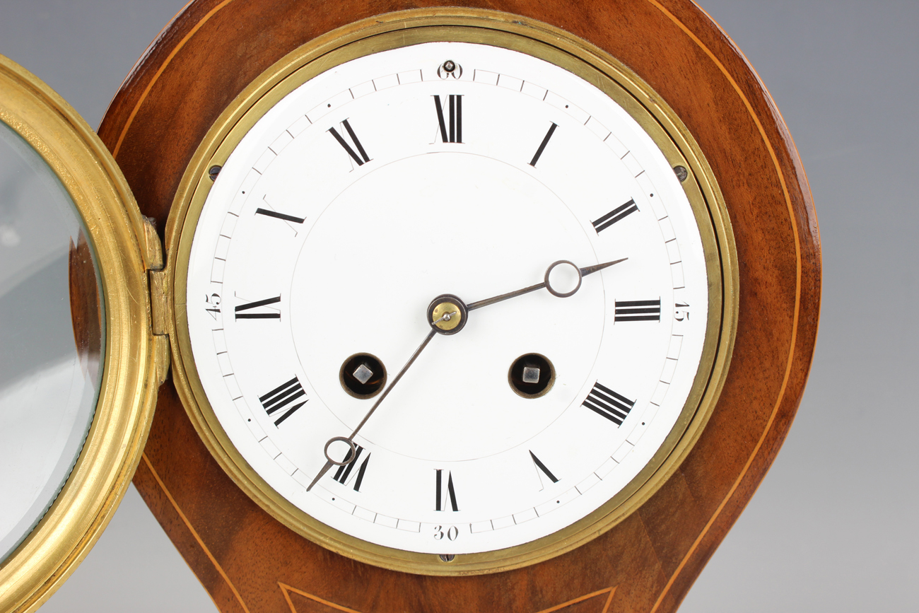An Edwardian mahogany balloon cased mantel clock with French eight day movement striking hours and - Image 8 of 8