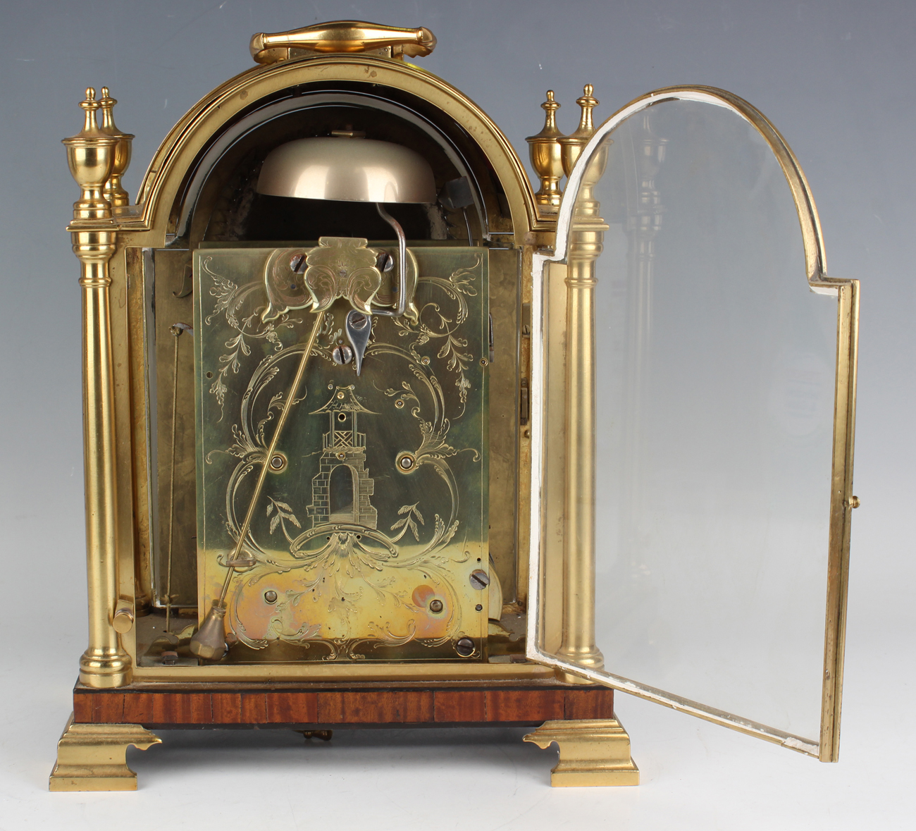 An early 20th century gilt lacquered brass and mahogany cased calendar bracket clock, the brass four - Image 6 of 7