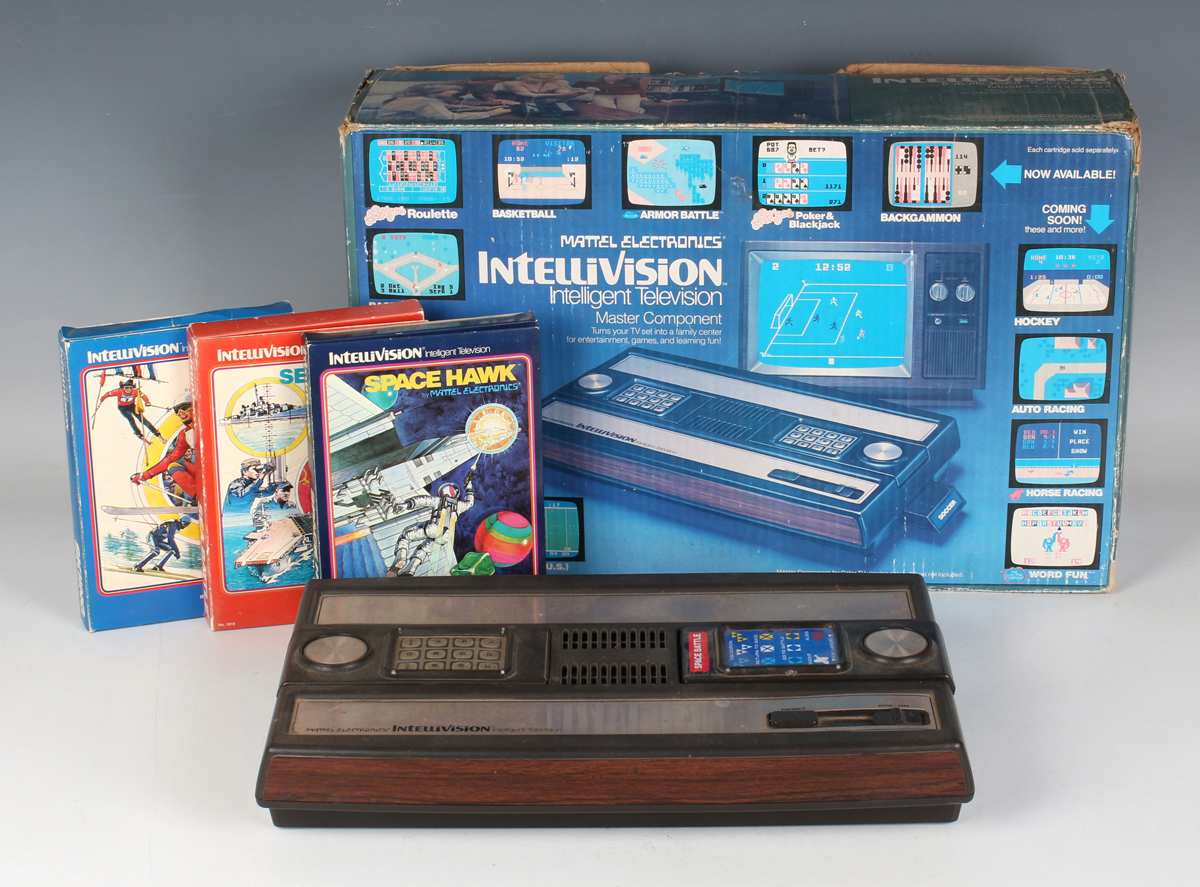 A Mattel Electronics Intellivision games console and fourteen games, including Space Spartans,