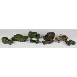 Eight Dinky Toys army vehicles, including No. 152B reconnaissance car and No. 151 six-wheeled