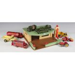 A collection of playworn diecast vehicles, including Dinky Toys and Supertoys No. 157 Jaguar, No.