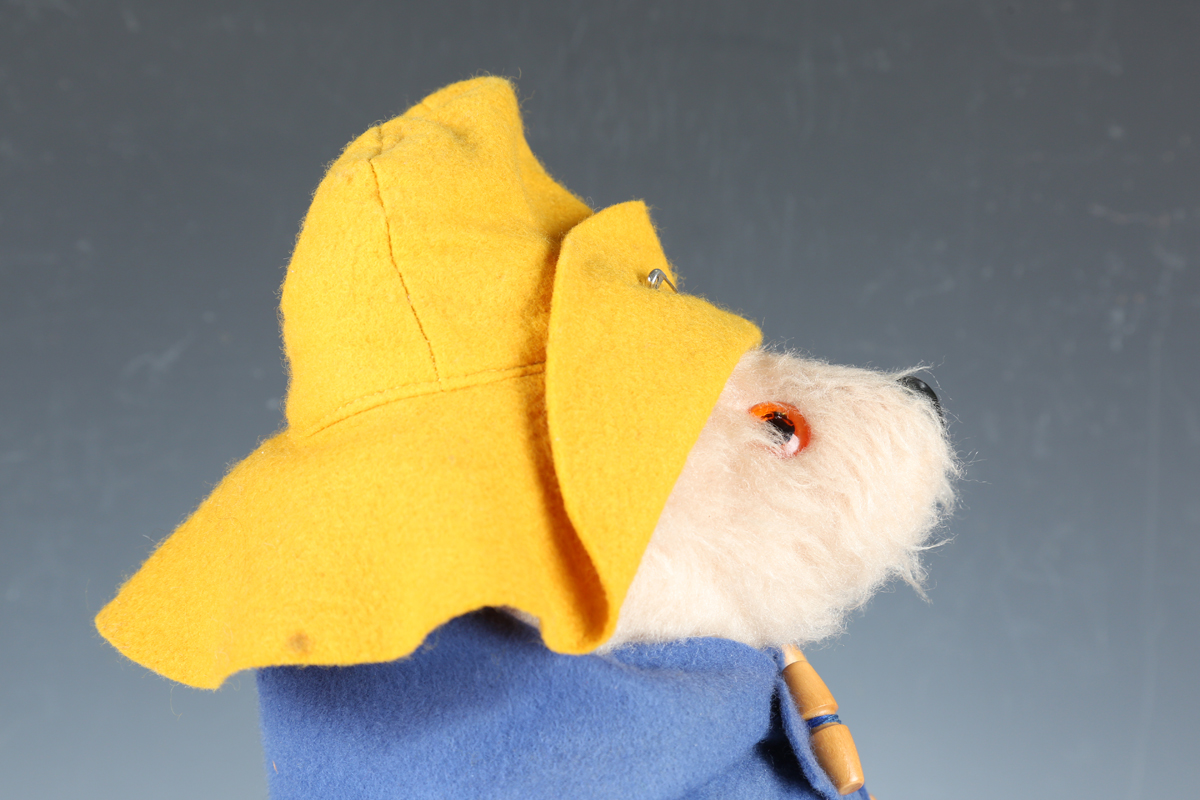 A Gabrielle Designs Ltd Paddington Bear wearing a yellow felt hat, duffle coat and yellow Dunlop - Image 5 of 9