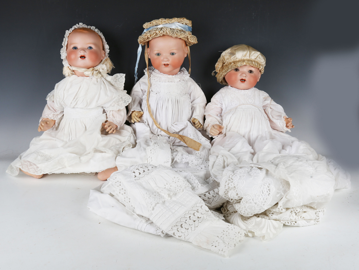 Four Armand Marseille bisque head baby dolls, each with painted moulded hair, sleeping eyes, open