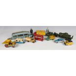 A collection of playworn diecast vehicles, including Dinky Toys and Supertoys cars, commercial