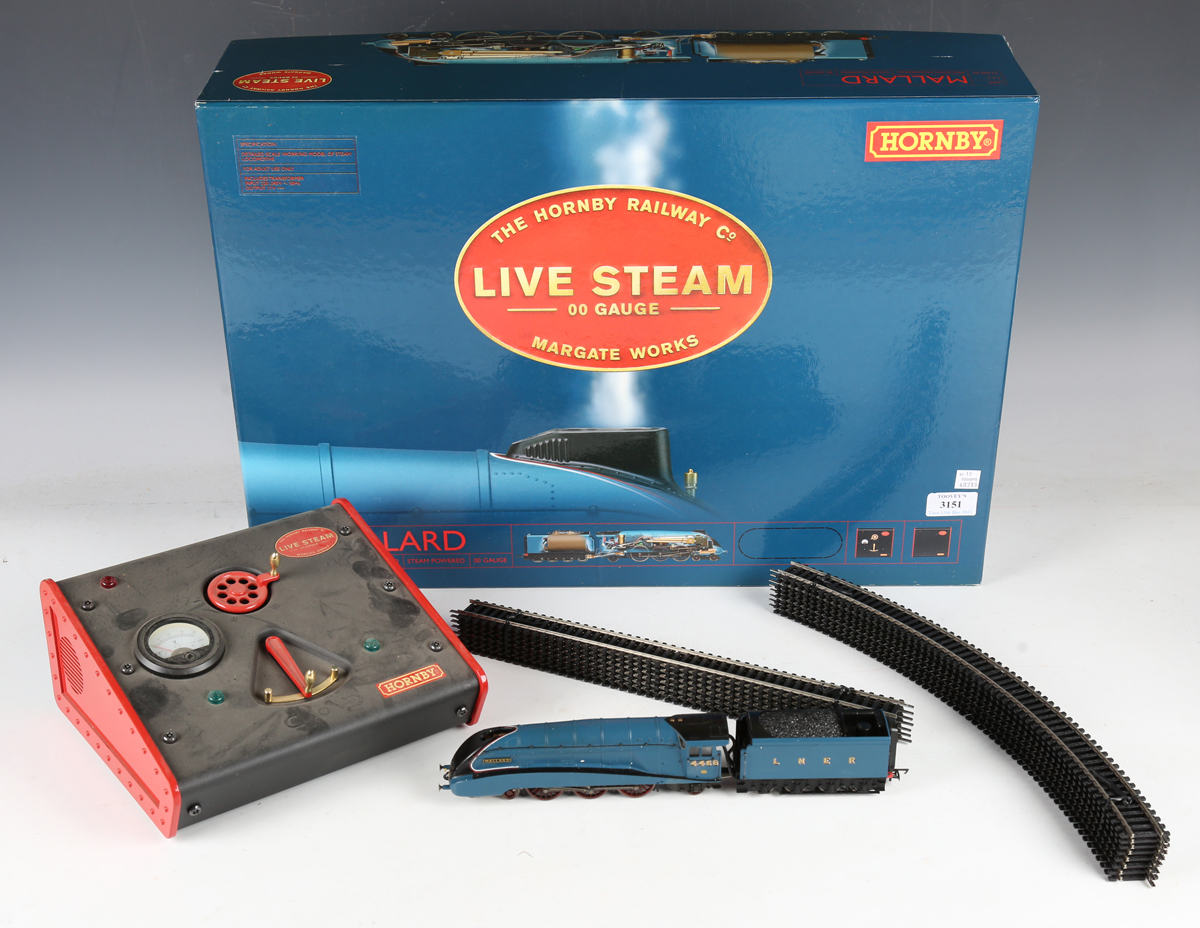 A Hornby gauge OO live steam locomotive 'Mallard' and tender with track, transformer and controller,