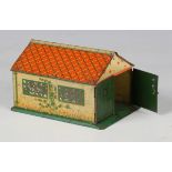 A Dinky Toys No. 45 tinplate garage with opening doors (some surface marks).Buyer’s Premium 29.4% (