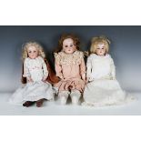 An Armand Marseille bisque head and shoulders doll, impressed '370 AM 2/0 DEP', with blonde wig,