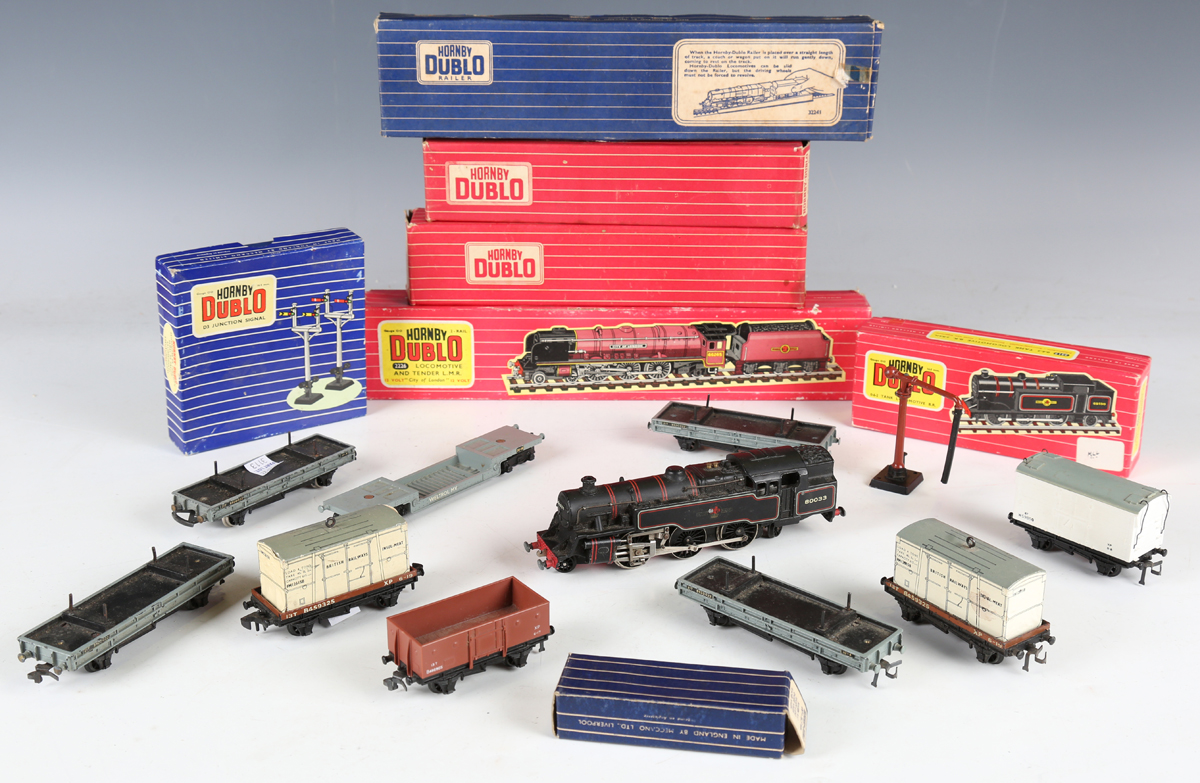 A collection of Hornby Dublo two-rail items, including No. 2226 locomotive 'City of London' and