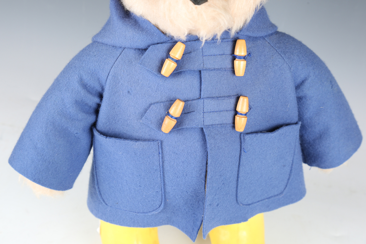 A Gabrielle Designs Ltd Paddington Bear wearing a yellow felt hat, duffle coat and yellow Dunlop - Image 8 of 9