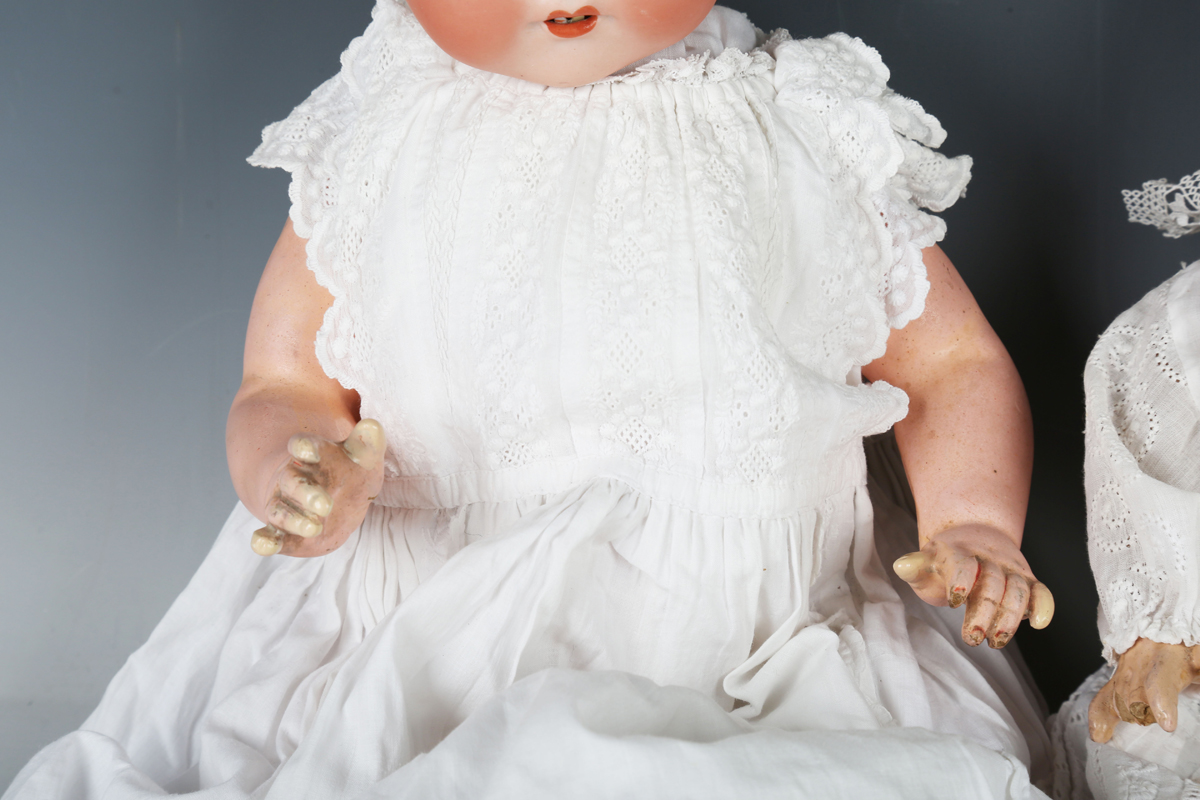 Four Armand Marseille bisque head baby dolls, each with painted moulded hair, sleeping eyes, open - Image 12 of 29