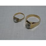 Two various unmarked gold dress rings set clear stones