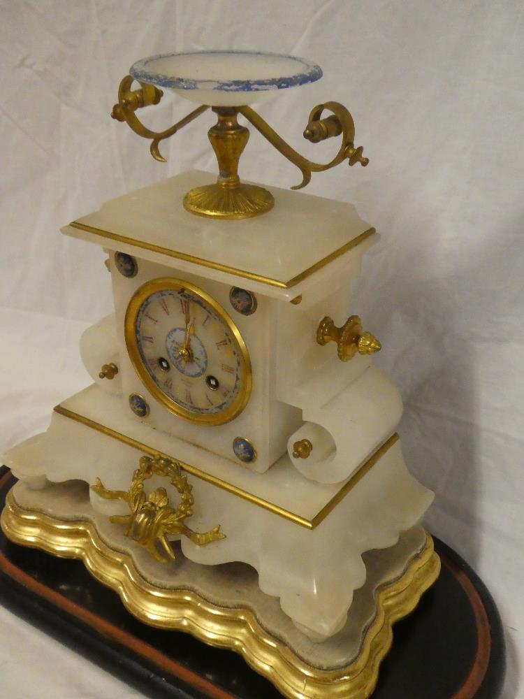 A 19th century French gilt mounted Alabaster mantel clock with circular dial in ornamental tapered - Image 2 of 3