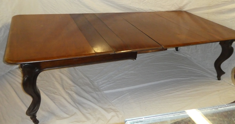 A mid Victorian figured mahogany extending dining table with three additional centre leaves on - Image 3 of 3