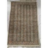 A good quality Eastern rectangular wool rug with geometric decoration 59" x 37"