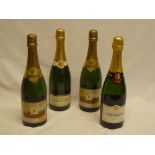 Four bottles of Champagne including a 1999 Jacquarat et Fils, Taittinger etc.