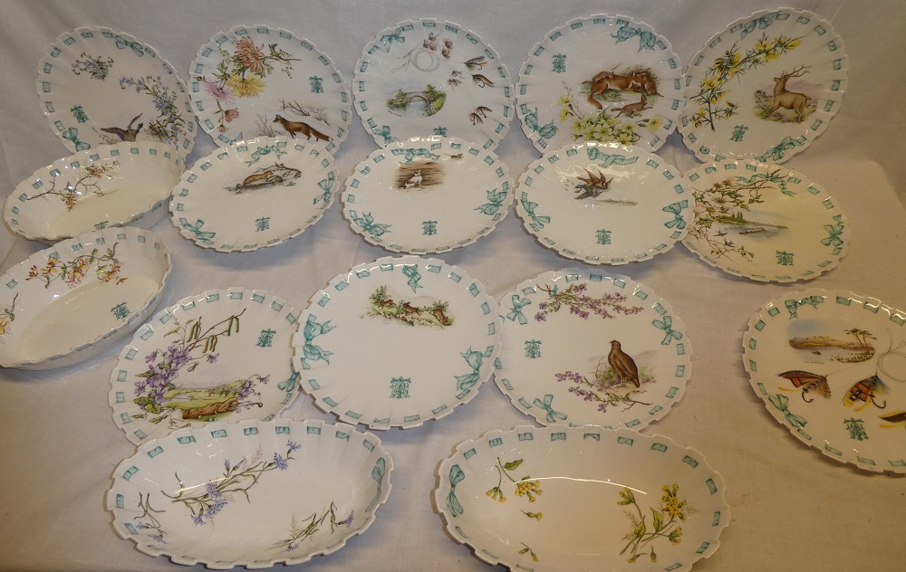 A good quality Copeland china part dessert set with wildlife and sporting decoration within ribbon