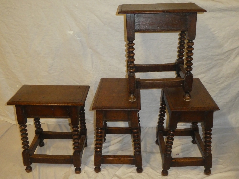 A set of four 17th century-style oak rectangular joint stools by Goodalls of Manchester with bobbin