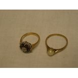 A 9ct gold dress ring set garnets and diamond chips and a 9ct gold dress ring set a single pearl