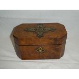A Victorian brass mounted walnut rectangular tea caddy with fitted interior enclosed by a decorated