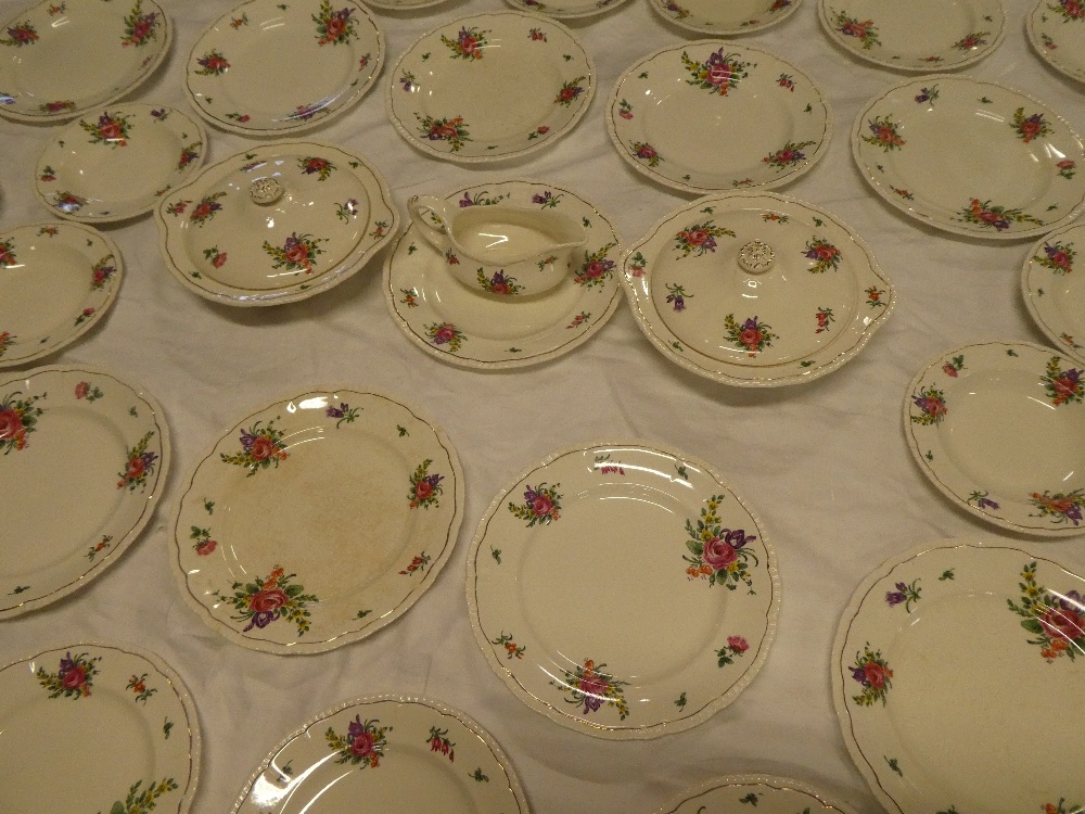 A Bristol pottery part dinner set with floral decorated borders comprising a pair of circular two - Image 2 of 2