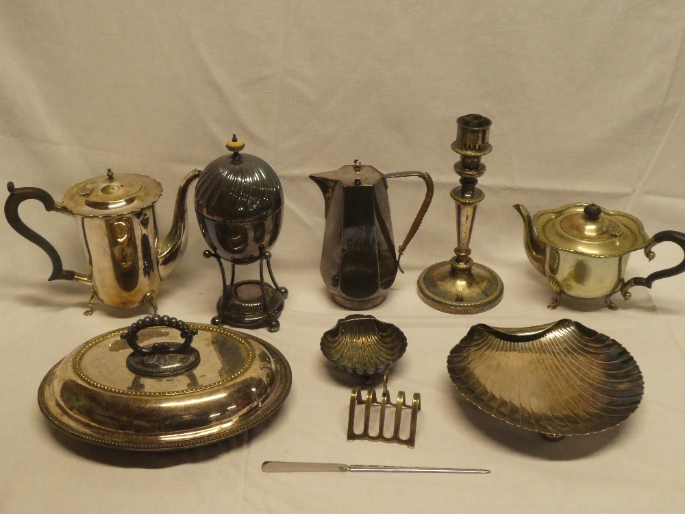 A selection of electro-plated items including single candlestick, tea pot, water pot,