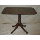 A 19th Century mahogany rectangular occasional table on turned column with scroll legs (af)