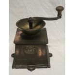 An old copper and brass No. 3 coffee grinder by E Pugh & Co.