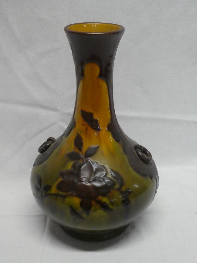 A large Bretby Pottery tapered vase with raised floral decoration 14½" high