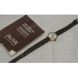 A lady's 9ct gold wrist-watch by Avia with leather strap