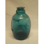 An unusual blue tinted glass tapered vase with internal strands,