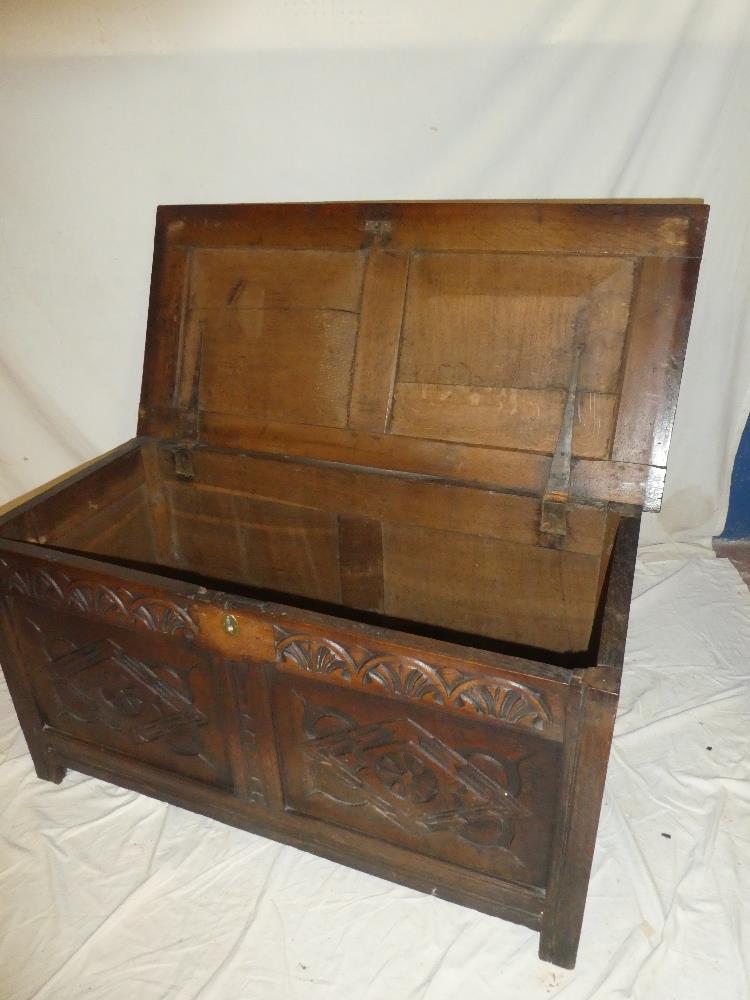 A late 18th/early 19th Century carved oak rectangular coffer with double panelled front and hinged - Image 2 of 2