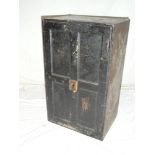 A 19th Century iron rectangular safe with panelled door and key,