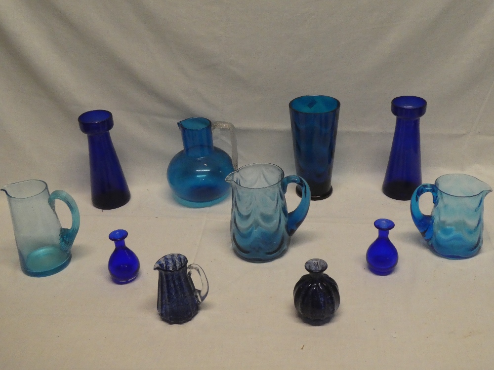 A selection of various blue tinted glassware including late Victorian tapered jug with spiral twist