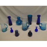 A selection of various blue tinted glassware including late Victorian tapered jug with spiral twist