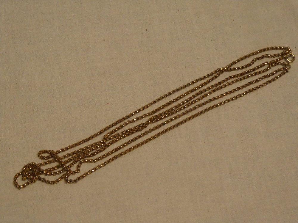 An old 9ct gold triple strand chain link necklace