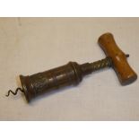 A 19th century Coney patent brass double action corkscrew with turned wood handle