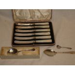 Two various silver preserve spoons,