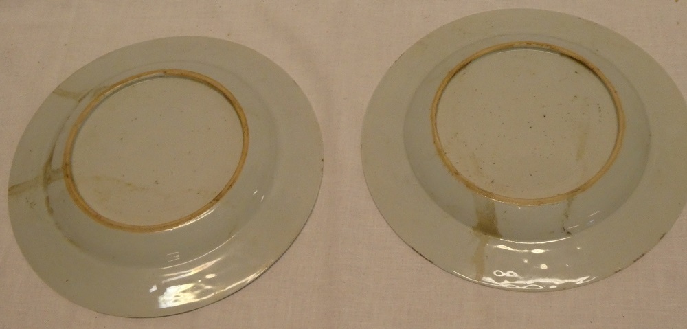 A pair of early 19th Century Famille Rose circular plates with floral decoration, - Image 2 of 2